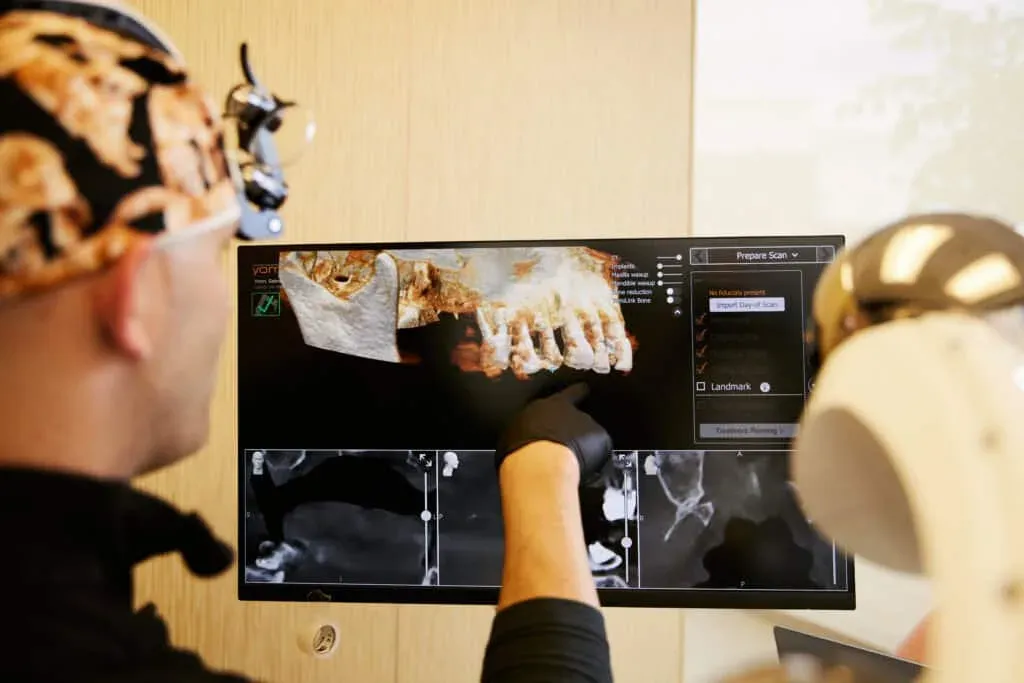 Dr Bryce Richardson examining a 3D scan of a patients mouth